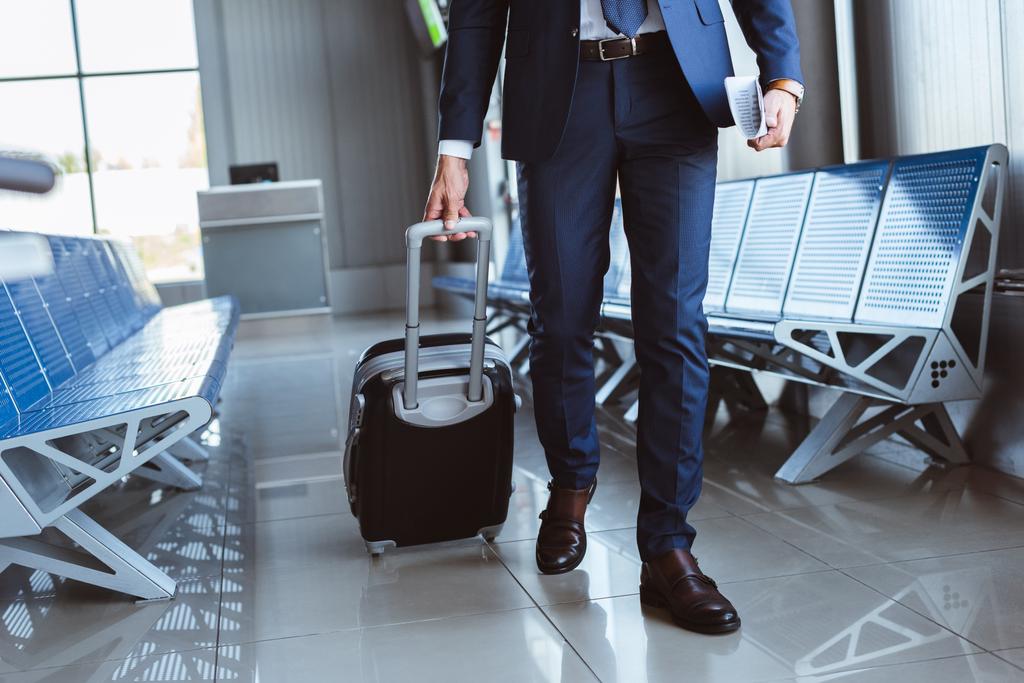 Close Up Of Businessman With Luggage Walking Free Stock Photo and Image